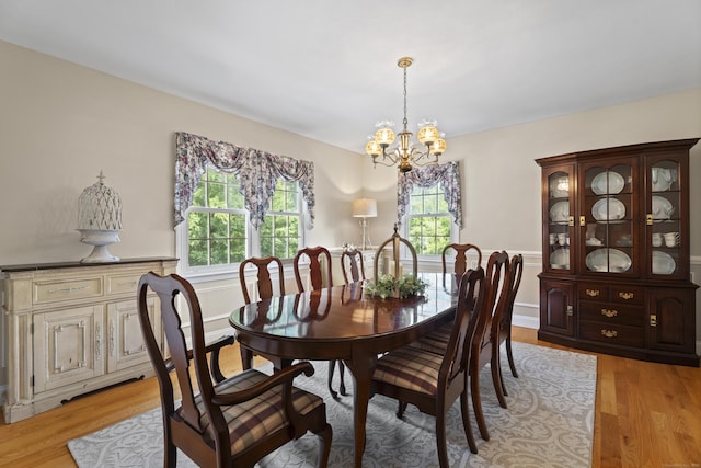 8 Marie Ln, Wallingford, CT 06492 - dining space with a chandelier and light wood-style flooring