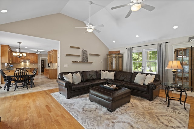8 Marie Ln, Wallingford, CT 06492 - living area featuring a ceiling fan, light wood finished floors, recessed lighting, a chandelier, and high vaulted ceiling
