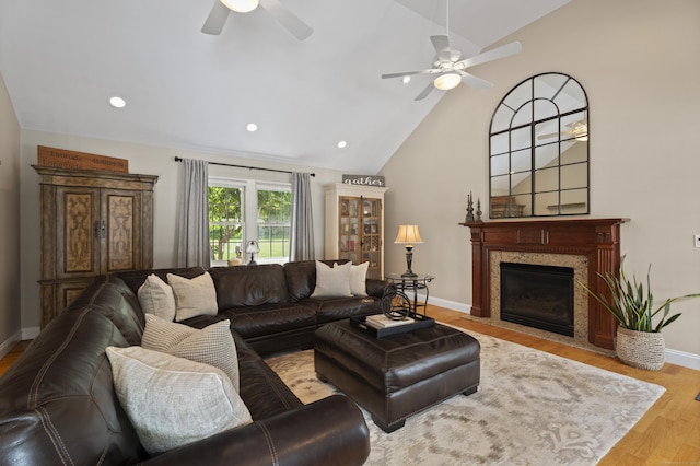 8 Marie Ln, Wallingford, CT 06492 - living area featuring a ceiling fan, wood finished floors, a high end fireplace, recessed lighting, and high vaulted ceiling