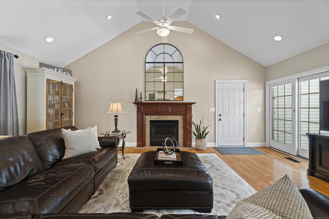 8 Marie Ln, Wallingford, CT 06492 - living area with a fireplace, ceiling fan, light wood-style floors, recessed lighting, and high vaulted ceiling