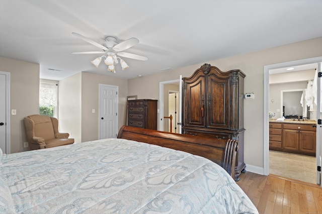 8 Marie Ln, Wallingford, CT 06492 - bedroom featuring light wood-style floors, ensuite bathroom, and a ceiling fan