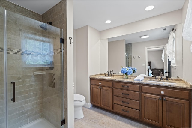 8 Marie Ln, Wallingford, CT 06492 - ensuite bathroom with a stall shower, double vanity, and tile patterned floors