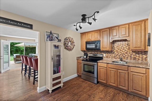 8 Marie Ln, Wallingford, CT 06492 - kitchen with electric range, black microwave, decorative backsplash, and dark wood-style floors