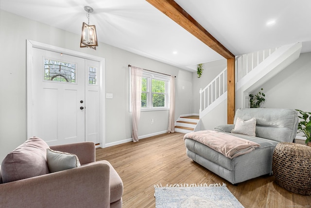1376 W St, Southington, CT 06489 - living area with stairs, wood finished floors, beamed ceiling, and recessed lighting