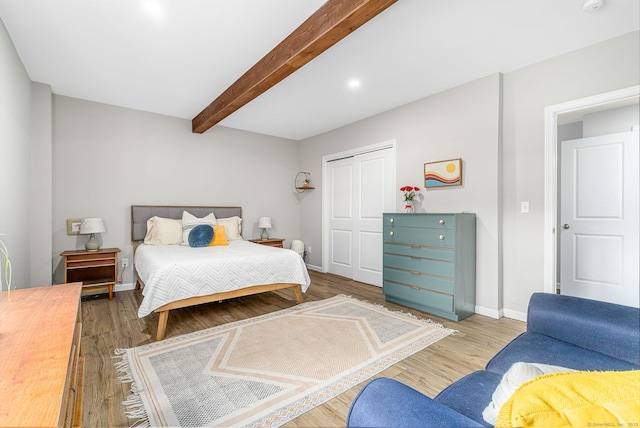 1376 W St, Southington, CT 06489 - bedroom with beam ceiling, wood finished floors, and a closet