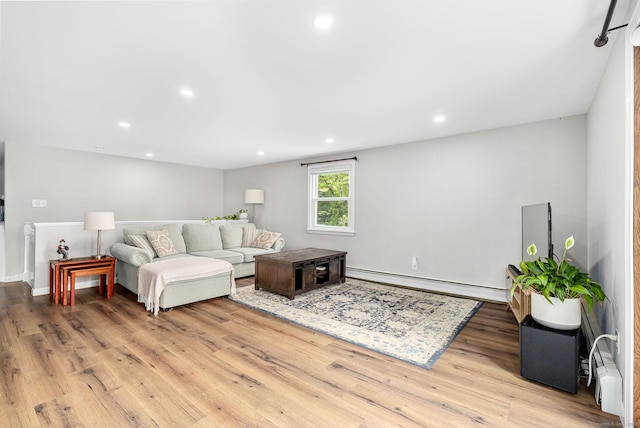 1376 W St, Southington, CT 06489 - living room with a baseboard radiator, wood finished floors, and recessed lighting