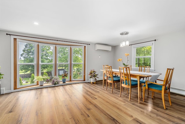 1376 W St, Southington, CT 06489 - dining room featuring a wall mounted air conditioner, a chandelier, and light wood-type flooring