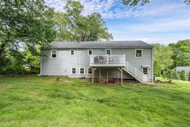 1376 W St, Southington, CT 06489 - rear view of property featuring stairway, a chimney, a deck, and a lawn