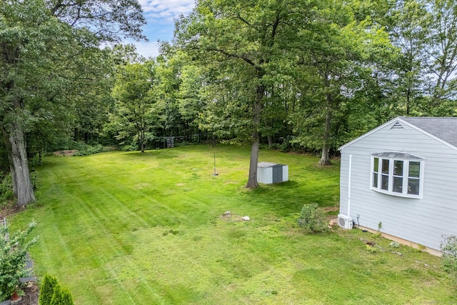 1376 W St, Southington, CT 06489 - view of grassy yard featuring a storage unit