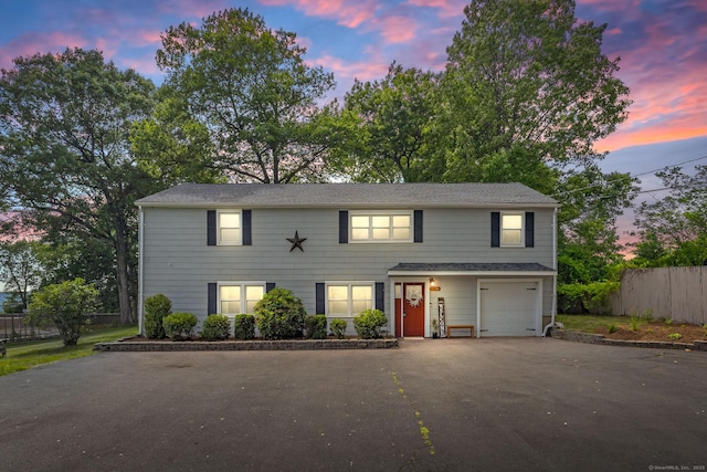 1376 W St, Southington, CT 06489 - view of front of home with driveway and an attached garage