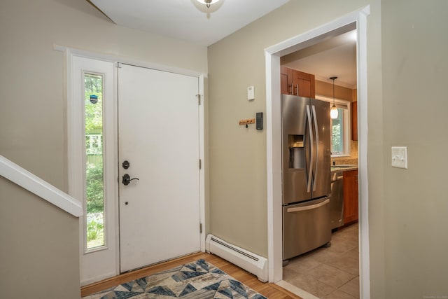 2 Talcott Gln Unit F, Farmington, CT 06032 - entryway with baseboard heating and light wood-type flooring
