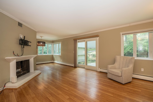 2 Talcott Gln Unit F, Farmington, CT 06032 - unfurnished living room featuring a baseboard radiator, ornamental molding, and wood finished floors