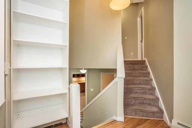 2 Talcott Gln Unit F, Farmington, CT 06032 - staircase featuring baseboard heating and wood finished floors