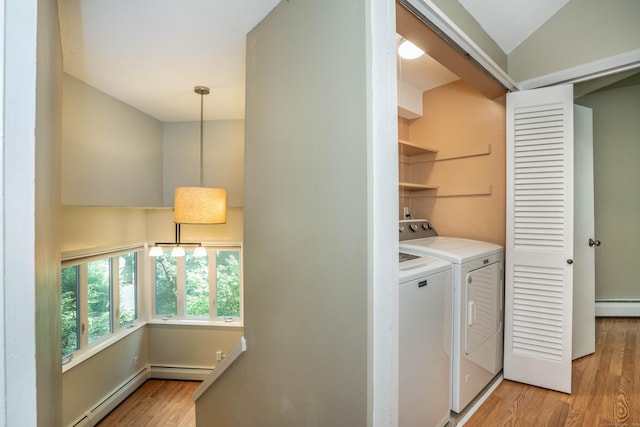 2 Talcott Gln Unit F, Farmington, CT 06032 - laundry area featuring wood finished floors, washer and clothes dryer, and a baseboard heating unit