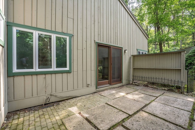 2 Talcott Gln Unit F, Farmington, CT 06032 - exterior space featuring a patio area and board and batten siding
