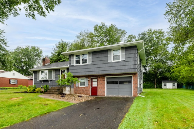 38 Evelyn Rd, Bristol, CT 06010 - tri-level home with an attached garage, asphalt driveway, a chimney, a front lawn, and brick siding