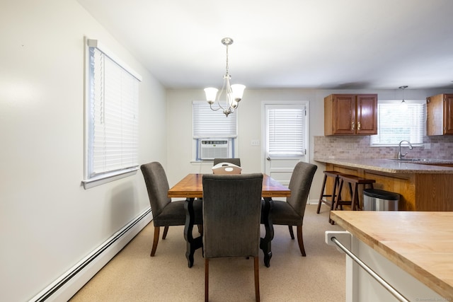 38 Evelyn Rd, Bristol, CT 06010 - dining room with baseboard heating, a chandelier, and cooling unit