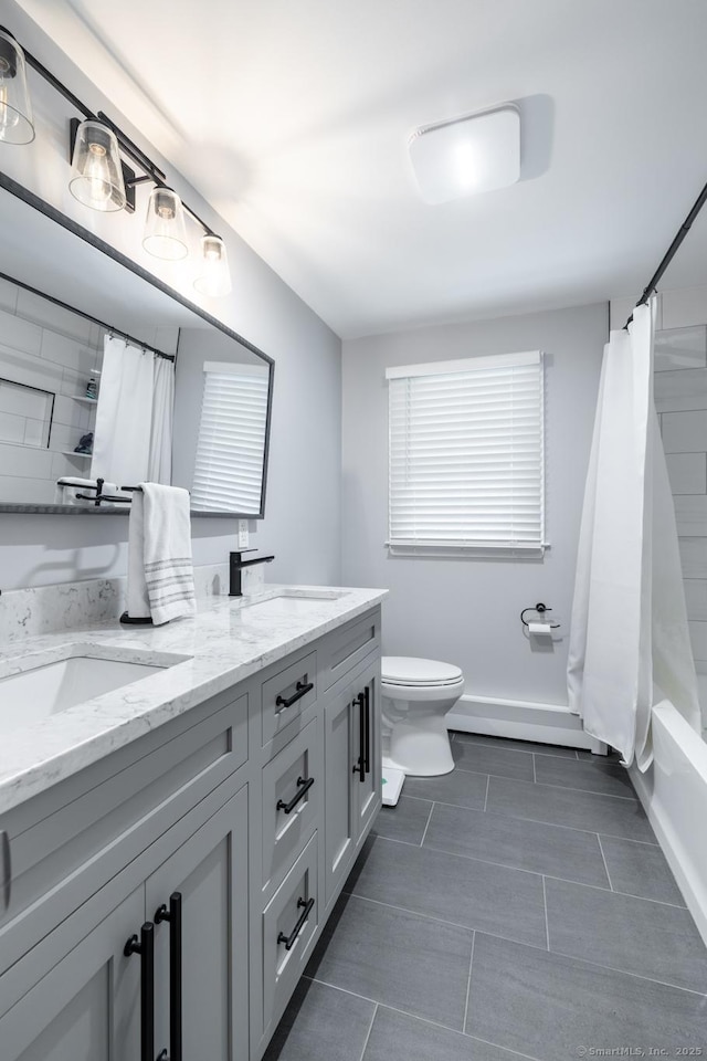 38 Evelyn Rd, Bristol, CT 06010 - bathroom featuring double vanity, tile patterned flooring, and shower / bath combination with curtain