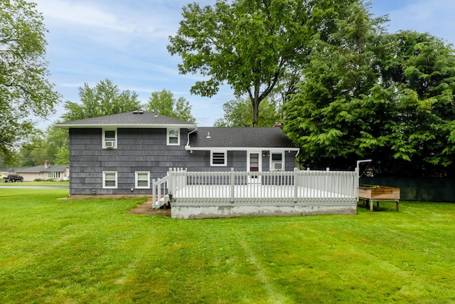 38 Evelyn Rd, Bristol, CT 06010 - back of house with a deck, a yard, and a shingled roof