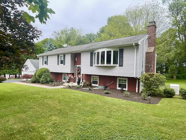 39 Mariner Cir, Trumbull, CT 06611 - raised ranch featuring a chimney and a front lawn