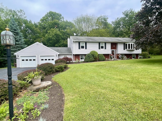 39 Mariner Cir, Trumbull, CT 06611 - raised ranch with asphalt driveway, a garage, and a front yard
