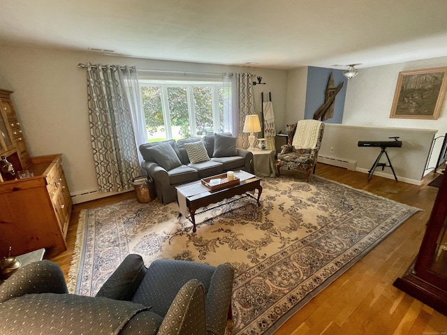 39 Mariner Cir, Trumbull, CT 06611 - living room featuring a baseboard radiator and wood finished floors