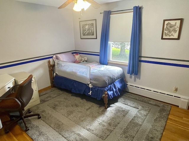 39 Mariner Cir, Trumbull, CT 06611 - bedroom featuring a baseboard radiator, wood finished floors, and a ceiling fan