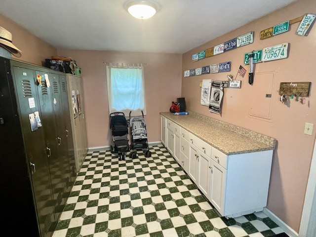 39 Mariner Cir, Trumbull, CT 06611 - kitchen with light floors, white cabinetry, and light countertops