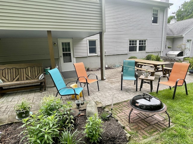 39 Mariner Cir, Trumbull, CT 06611 - view of patio featuring an outdoor fire pit, outdoor dining space, and area for grilling