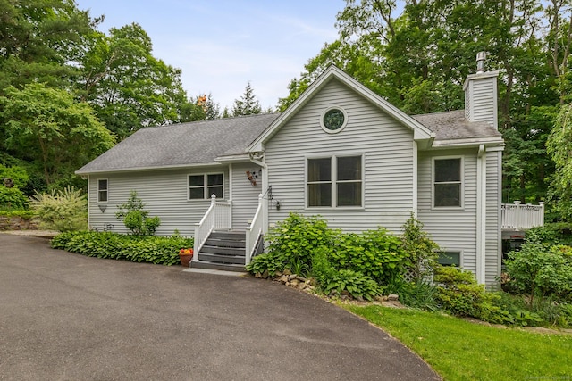 12 Haas Rd, Somers, CT 06071 - view of front of home featuring a chimney and a shingled roof