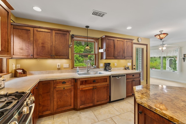 12 Haas Rd, Somers, CT 06071 - kitchen with stainless steel appliances, light tile patterned flooring, ceiling fan, pendant lighting, and recessed lighting