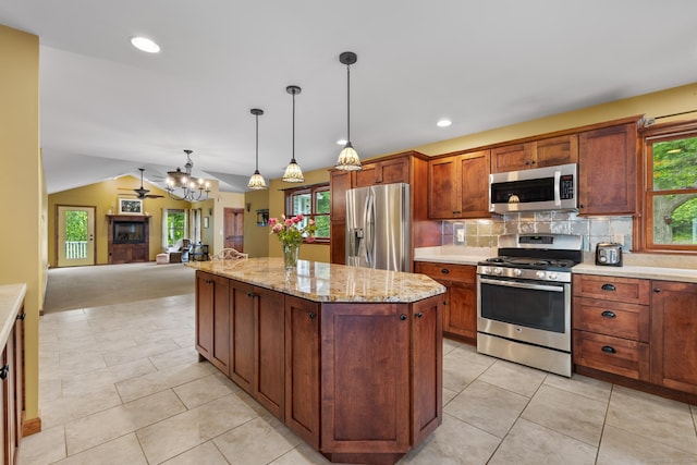 12 Haas Rd, Somers, CT 06071 - kitchen with appliances with stainless steel finishes, a center island, open floor plan, backsplash, and a chandelier
