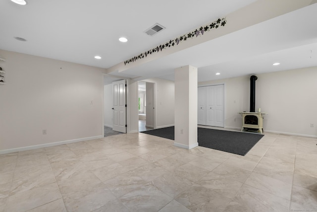 12 Haas Rd, Somers, CT 06071 - below grade area featuring a wood stove and recessed lighting