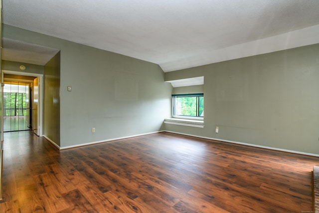65 Heritage Vlg Unit B, Southbury, CT 06488 - unfurnished room featuring wood finished floors and vaulted ceiling