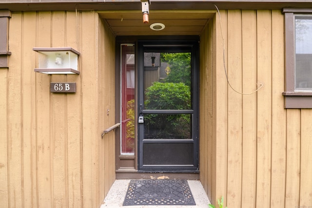 65 Heritage Vlg Unit B, Southbury, CT 06488 - property entrance featuring board and batten siding and uncovered parking