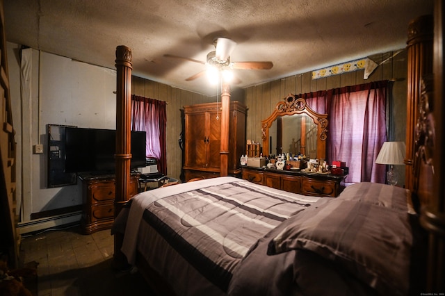 90 Olive St, Bridgeport, CT 06605 - bedroom with a baseboard heating unit, a textured ceiling, and a ceiling fan