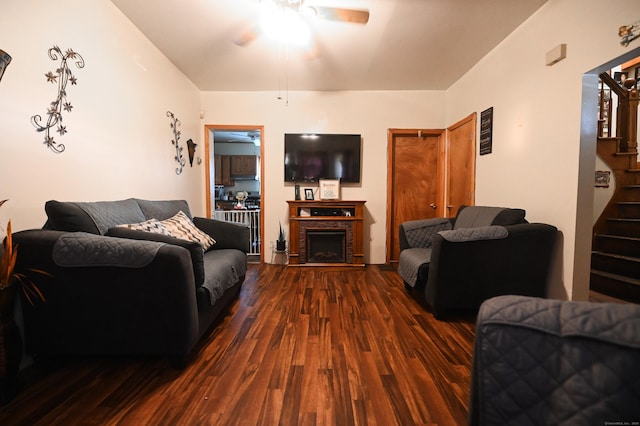 90 Olive St, Bridgeport, CT 06605 - living room featuring a ceiling fan, dark wood-style floors, stairs, and a brick fireplace