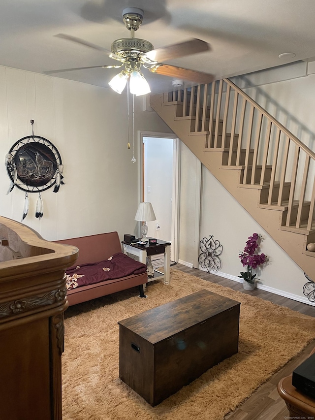 90 Olive St, Bridgeport, CT 06605 - living room with a ceiling fan, stairs, and wood finished floors