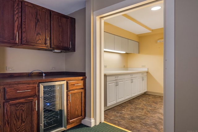 3 Essex Sq, Essex, CT 06426 - indoor dry bar featuring wine cooler and dark carpet