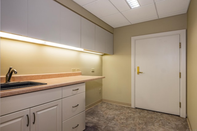 3 Essex Sq, Essex, CT 06426 - laundry area featuring a sink and baseboards