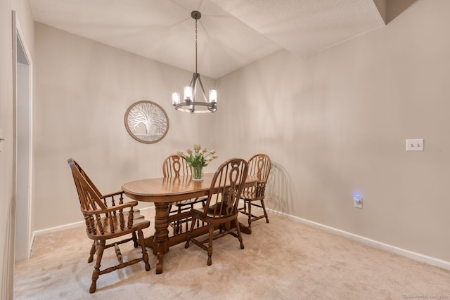 33 Langdon Ct Apt Cl4, Berlin, CT 06037 - dining space featuring carpet flooring, a chandelier, and vaulted ceiling