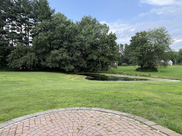 491 Main St, Somers, CT 06071 - view of grassy yard with a water view and a patio