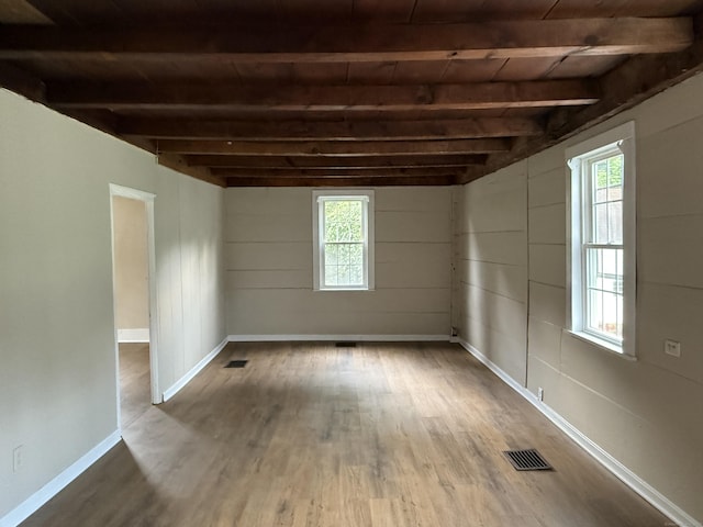 491 Main St, Somers, CT 06071 - spare room featuring wood finished floors, healthy amount of natural light, and a wooden ceiling with exposed beams
