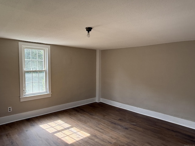 491 Main St, Somers, CT 06071 - unfurnished room featuring dark wood finished floors and a textured ceiling
