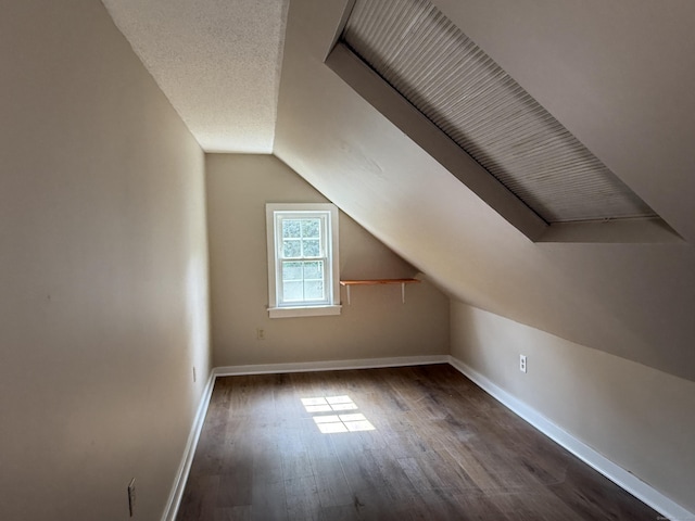 491 Main St, Somers, CT 06071 - additional living space featuring dark wood-style floors and lofted ceiling