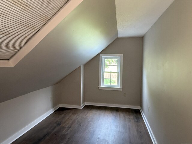 491 Main St, Somers, CT 06071 - additional living space with dark wood finished floors and lofted ceiling