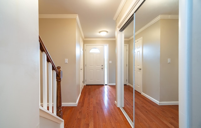 19 Heather Ct Unit 19, Cromwell, CT 06416 - entryway with wood finished floors, stairs, and crown molding