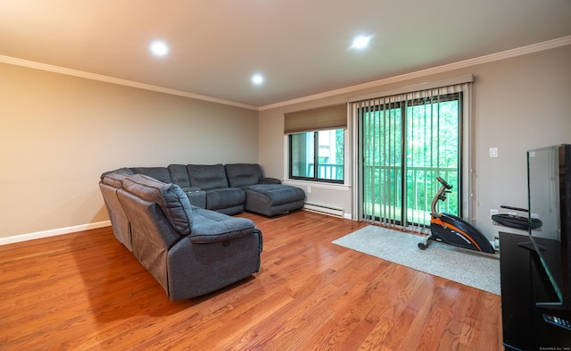 19 Heather Ct Unit 19, Cromwell, CT 06416 - living area with a baseboard radiator, light wood finished floors, ornamental molding, and recessed lighting