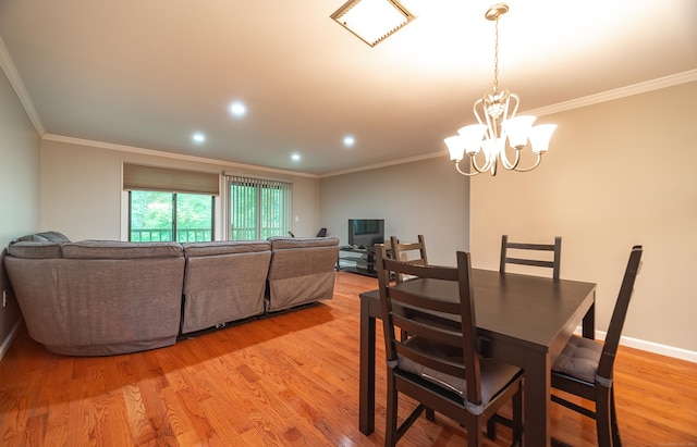 19 Heather Ct Unit 19, Cromwell, CT 06416 - dining room with light wood-type flooring, ornamental molding, a chandelier, and recessed lighting