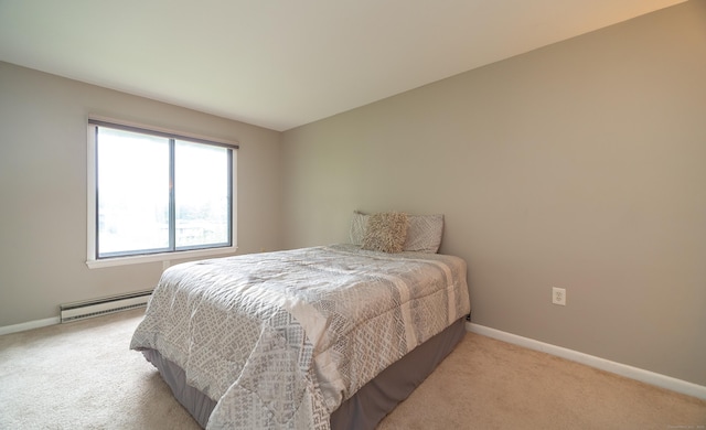 19 Heather Ct Unit 19, Cromwell, CT 06416 - bedroom with a baseboard radiator and light carpet